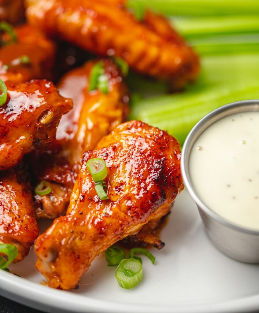 Close-up of crispy air fryer chicken wings with golden-brown skin