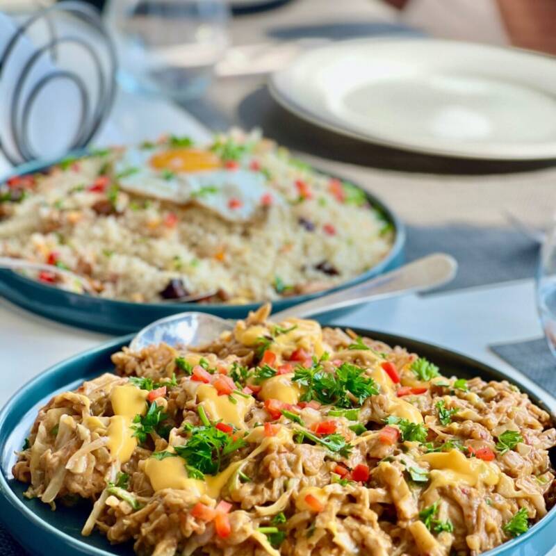 Shredded slow cooker BBQ chicken served with couscous