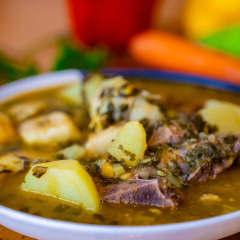 Close up of a bowl of hearty beef stew with vegetables, ready to serve