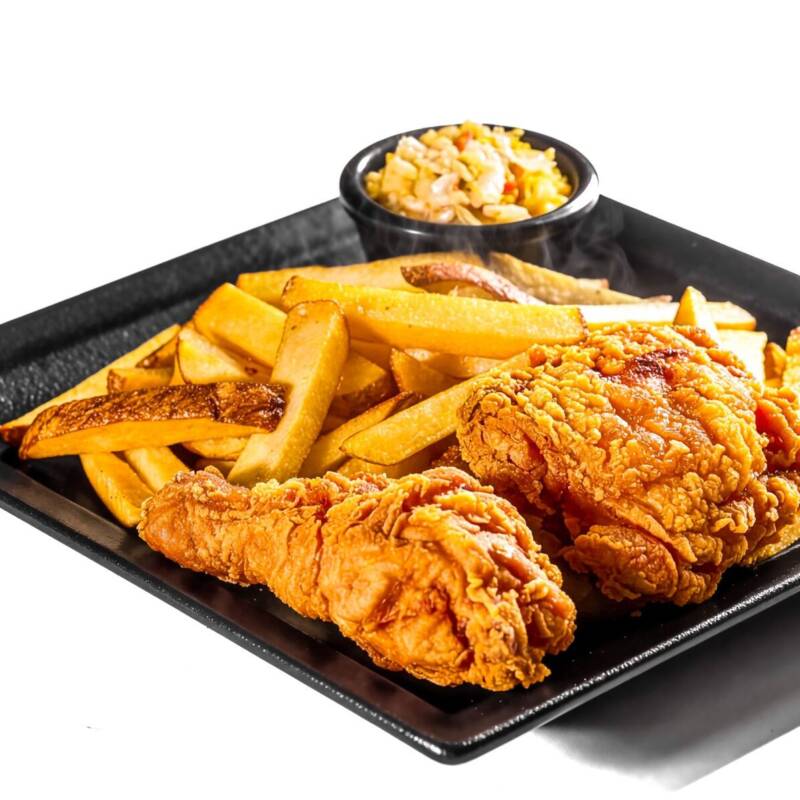 Crispy Southern fried chicken served with fries and coleslaw